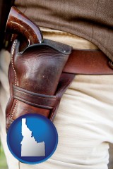 idaho map icon and a gun in a Western-style, leather holster