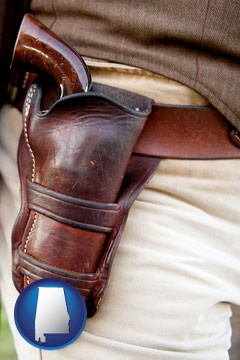 a gun in a Western-style, leather holster - with Alabama icon