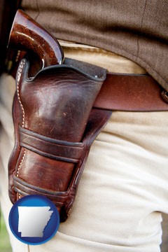 a gun in a Western-style, leather holster - with Arkansas icon