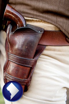 a gun in a Western-style, leather holster - with Washington, DC icon