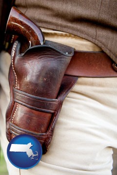a gun in a Western-style, leather holster - with Massachusetts icon